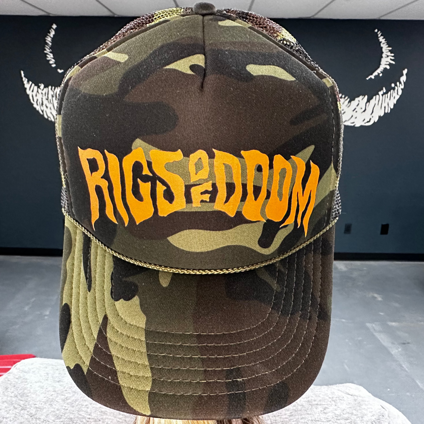 Rigs of Doom - Camo Trucker Cap with Orange Logo