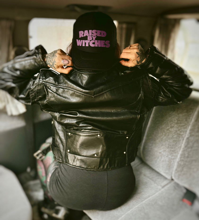 Raised By Witches - Reality Master Logo Black Trucker