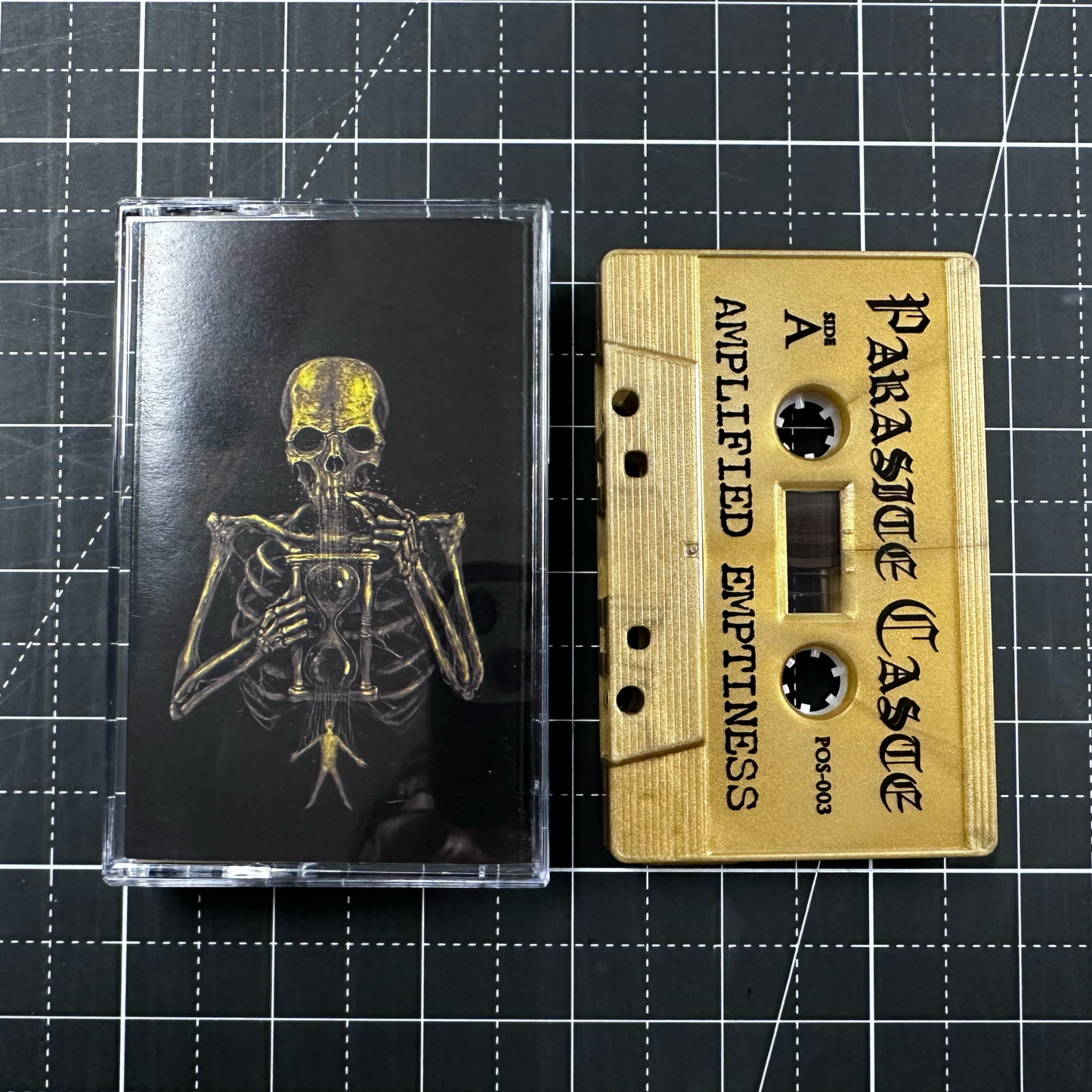Parasite Caste Gold Cassette and J Card