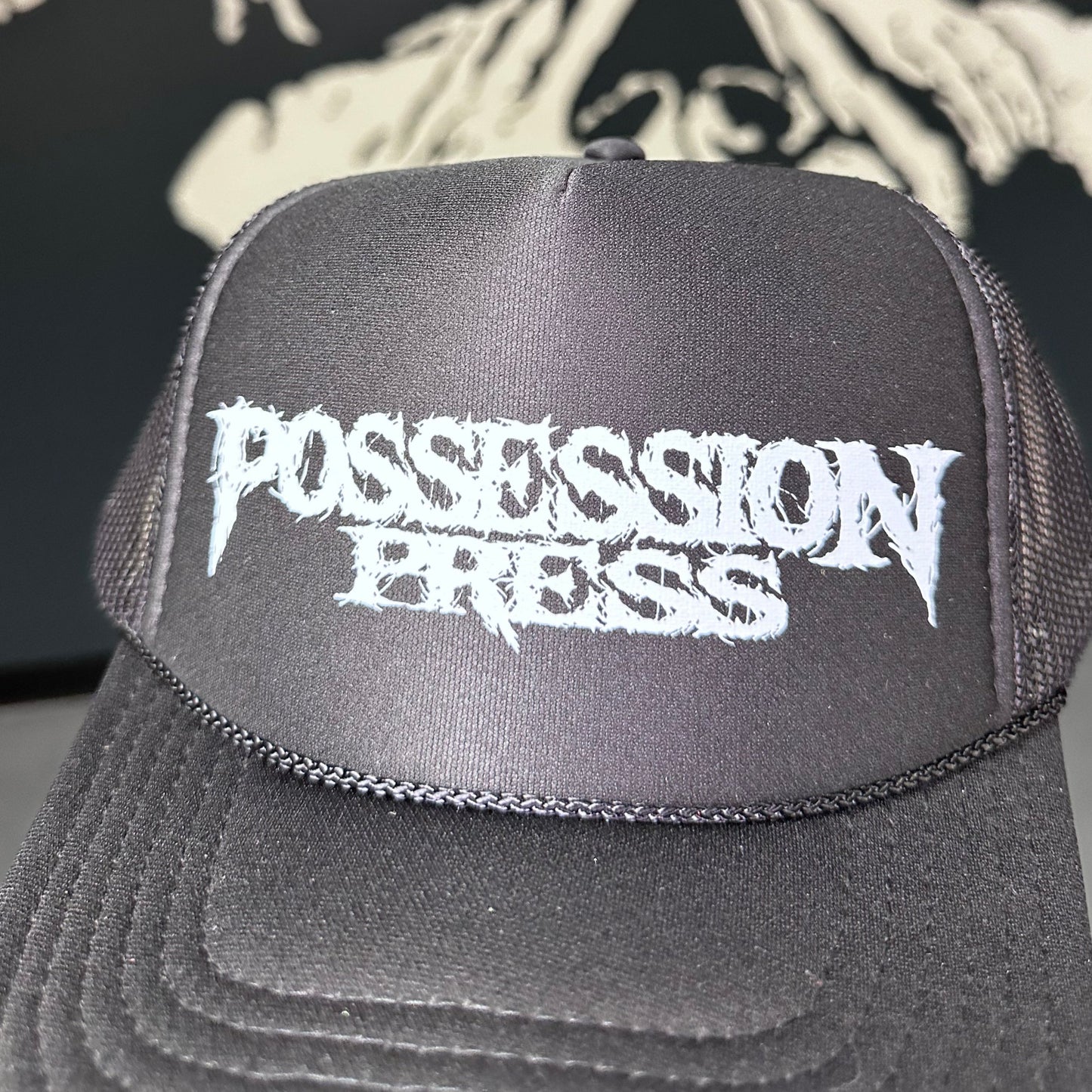 Possession Press - Black with white logo Trucker Cap