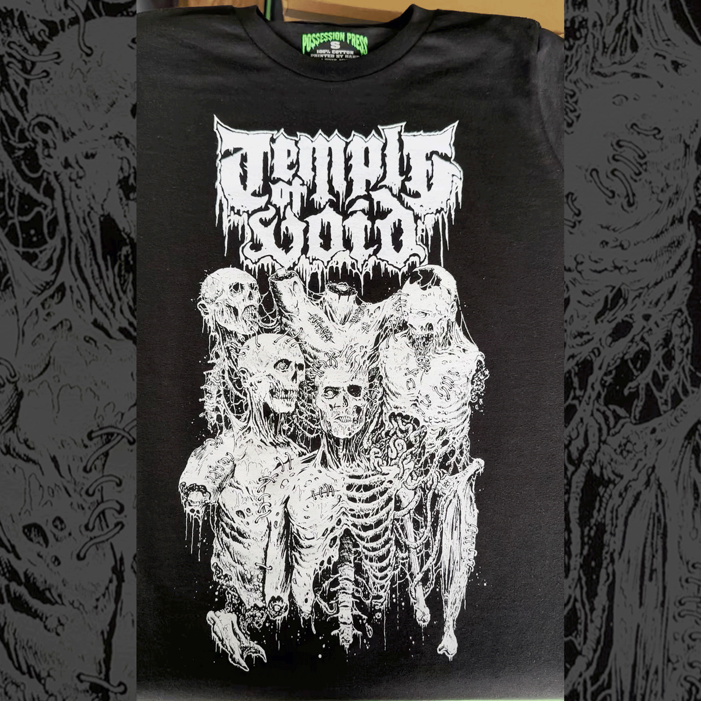 Black t-shirt with white print of skeletons and text 'Temple of Void' in glow in the dark ink