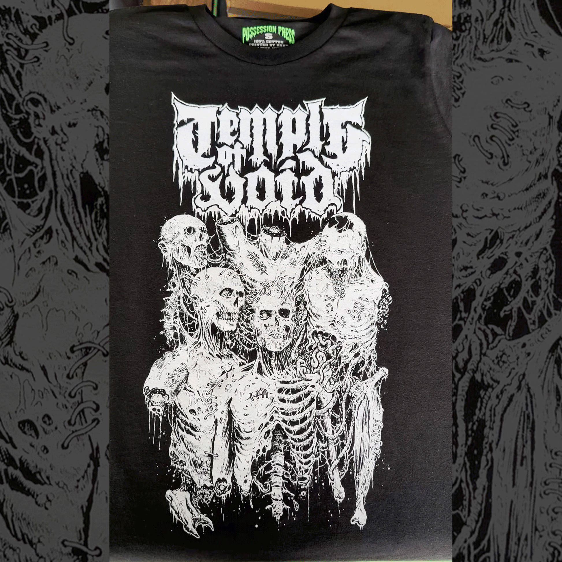 Black t-shirt with white print of skeletons and text 'Temple of Void' in glow in the dark ink