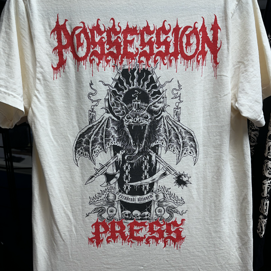 Ivory t-shirt with black and red graphic design featuring a bat-like creature and text on a white background.