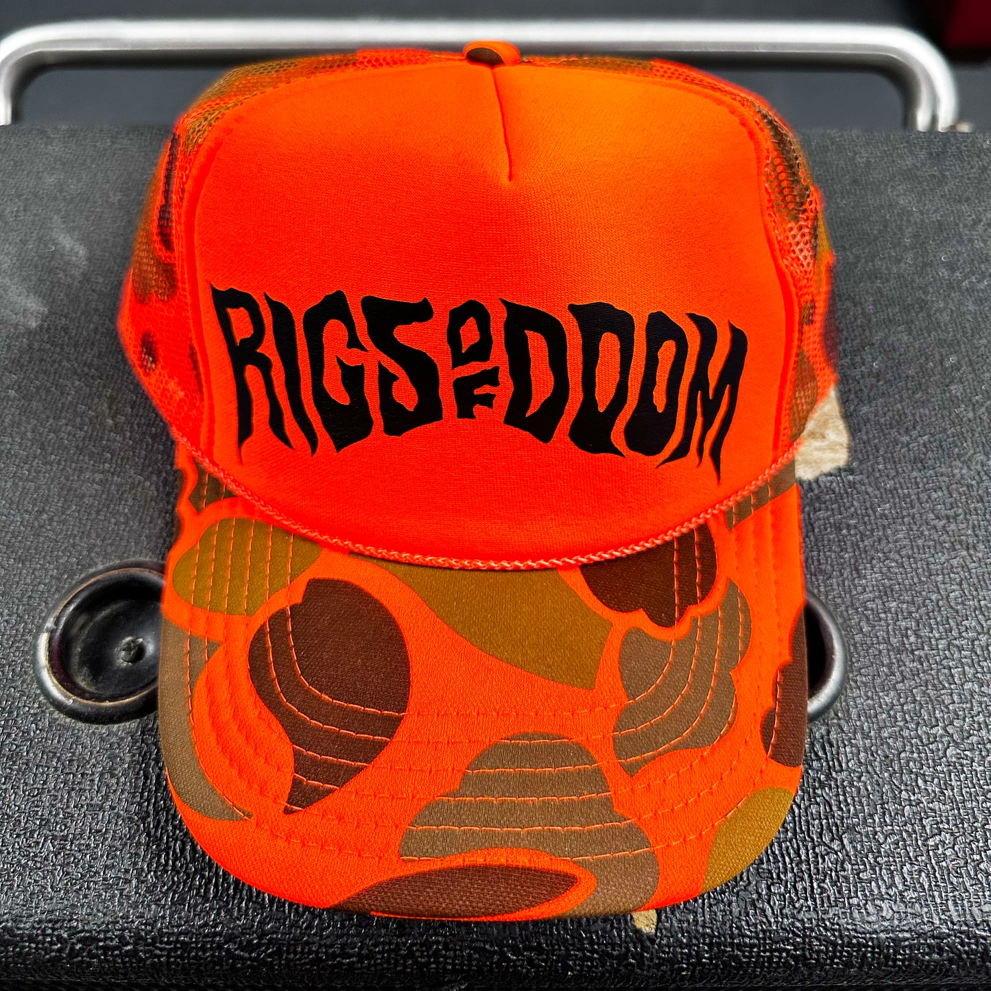 Rigs of Doom - Orange Camo Trucker Cap with Black Logo